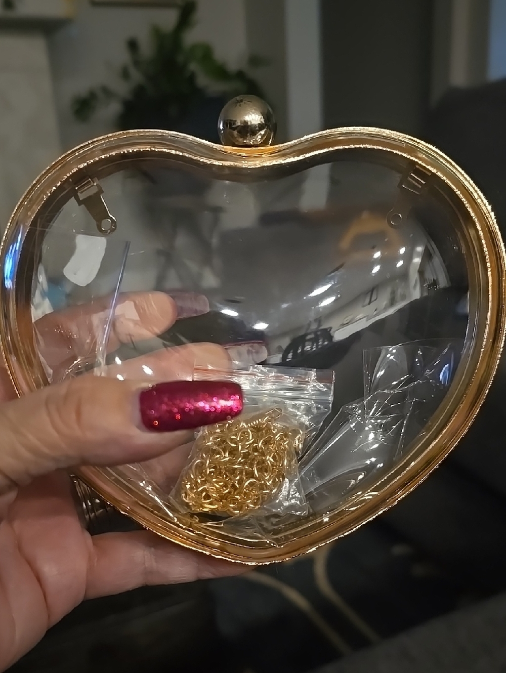 Clear Heart-Shaped Clutch with Gold Trim